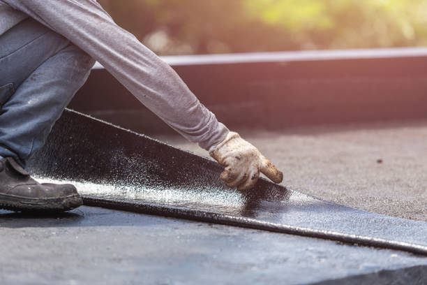 Professional Waterproofing technician working in Rex, GA